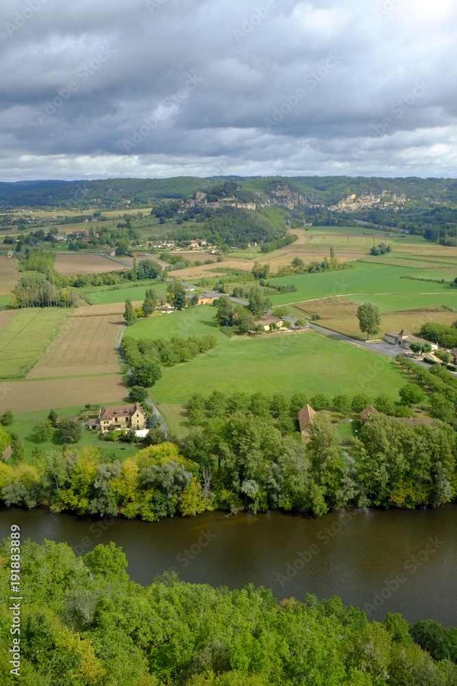 Late summer view over patchwork fields and river of the Dordogne valley near Castelnaud-la-Chapelle, Aquitane, France