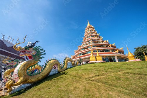 Golden Pagoda nine tier with dragon texture at Chinese temple - wat hyua pla kang , Chiang Rai,northern of Thailand © martinhosmat083