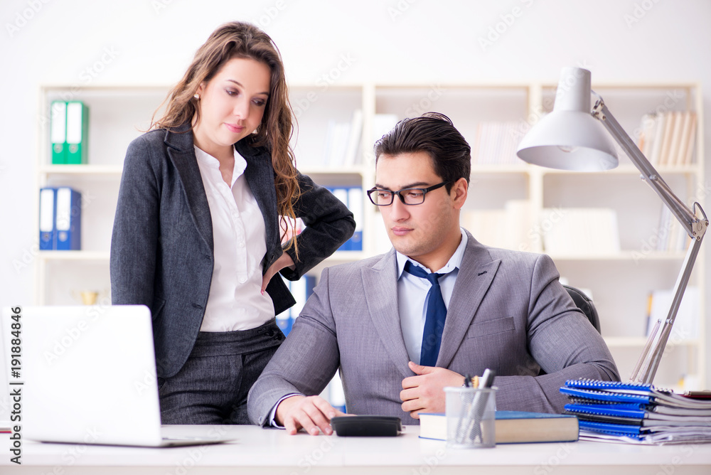Sexual harassment concept with man and woman in office Sexual harassment concept with man and woman in office