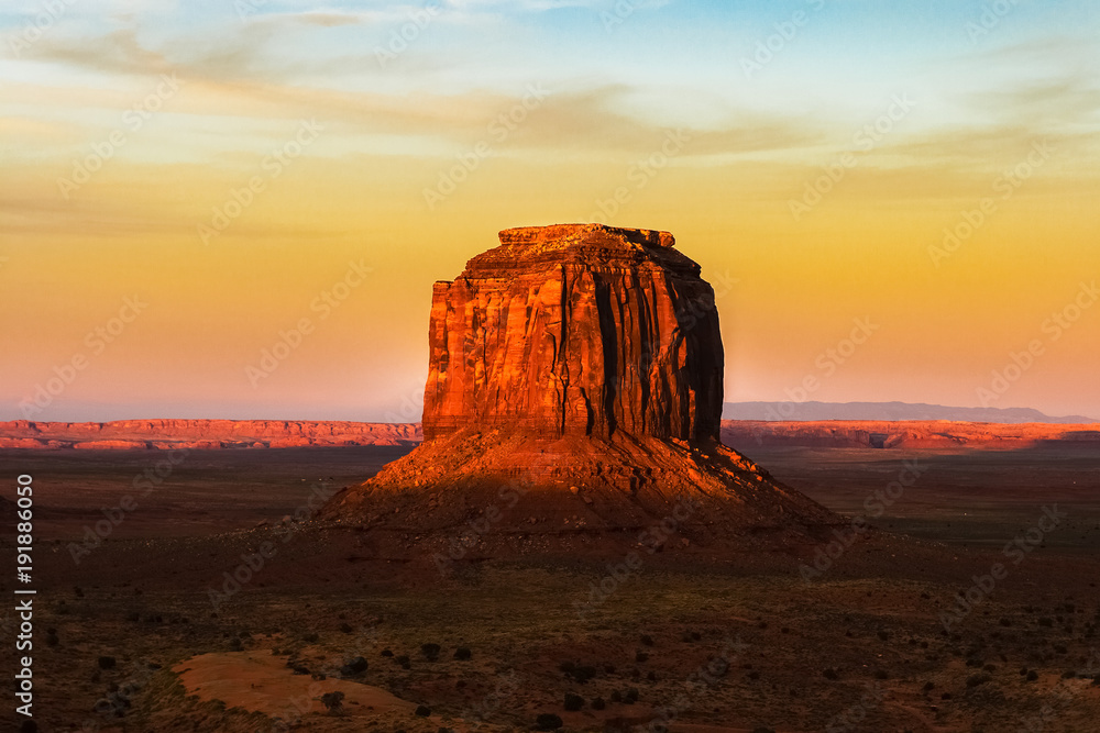 The Merrick Butte hit by the sunset in Monument Valley Tribal Navajo Park, Arizona