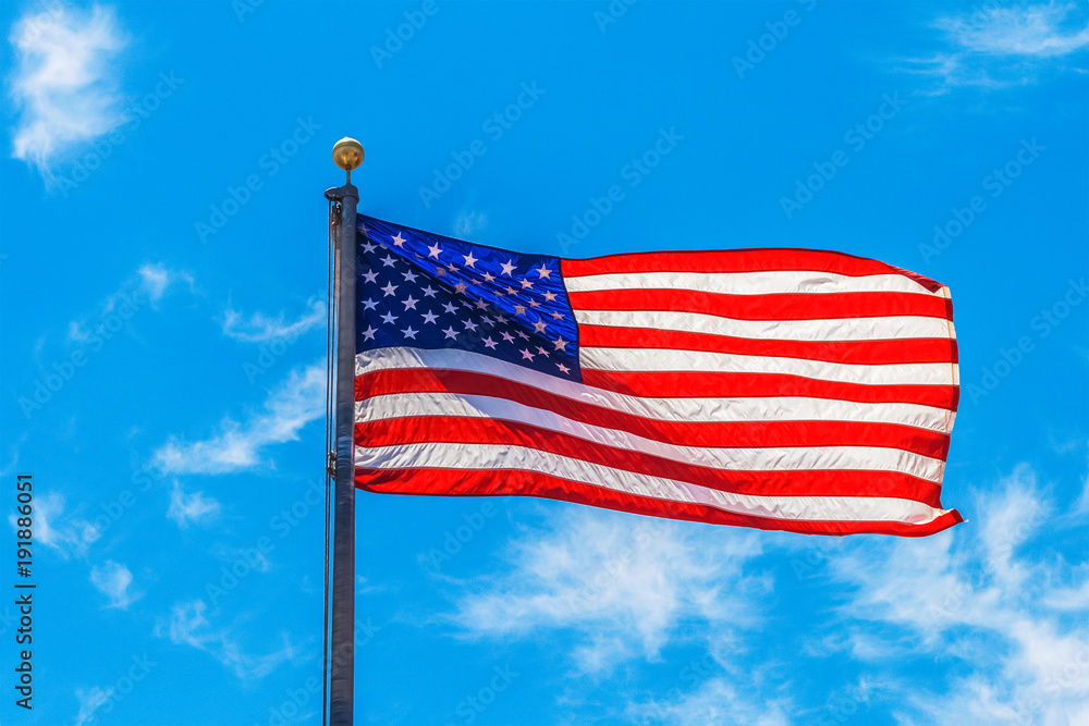 The american flag waving in the air The american flag waving in the air