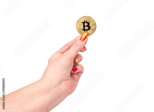 Gold coin bitcoin in hand