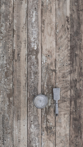 brush on an old rustic weathered wooden background