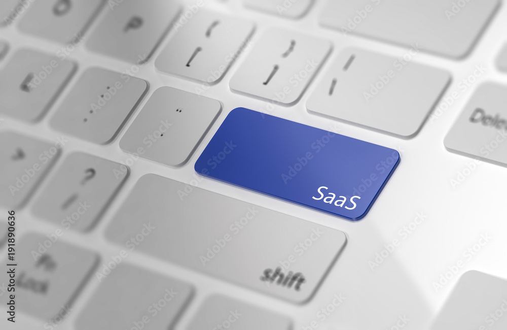 Blue SaaS button on keyboard. Soft focus. Blue SaaS button on keyboard. Soft focus.