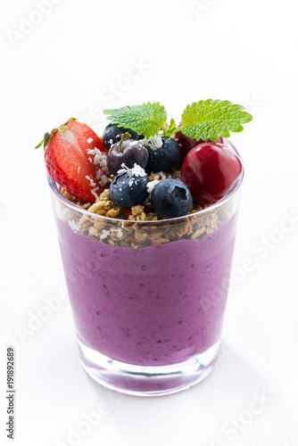 blueberry yogurt with granola on a white background  vertical