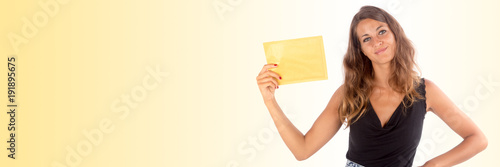 Pretty woman holding a blank envelope, isolated on white, customizable background