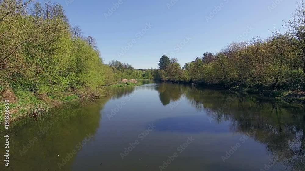 fly over forest river, 4K Aerial view of small river, flying over the river fly over forest river, 4K Aerial view of small river, flying over the river