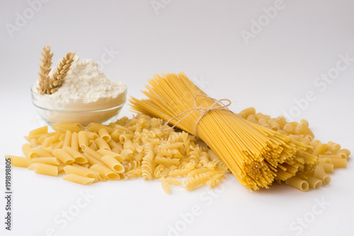 Foto Multicolored pasta on a light background.