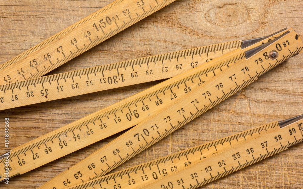 Measuring Stick on a Wooden Table Measuring Stick on a Wooden Table