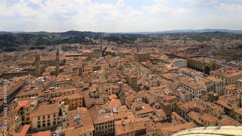 City panorama, aerila view, Florence, Tuscany, Italy; roofs, buildings and towers.