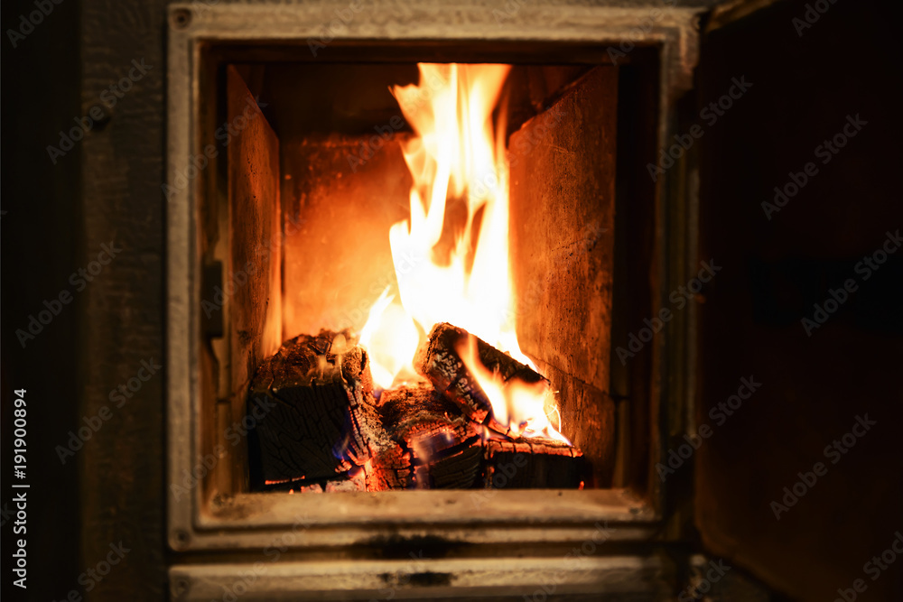 Red-yellow flames in the furnace of the old furnace Red-yellow flames in the furnace of the old furnace