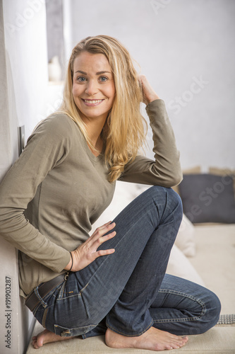 young woman at home in living room