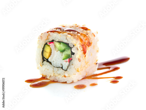 Sushi roll isolated on white background. California sushi roll with tuna, vegetables and unagi sauce closeup