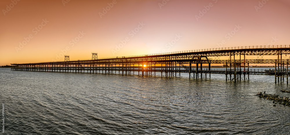 Panoramic view of Tinto river pier at sunset in Huelva, Spain.