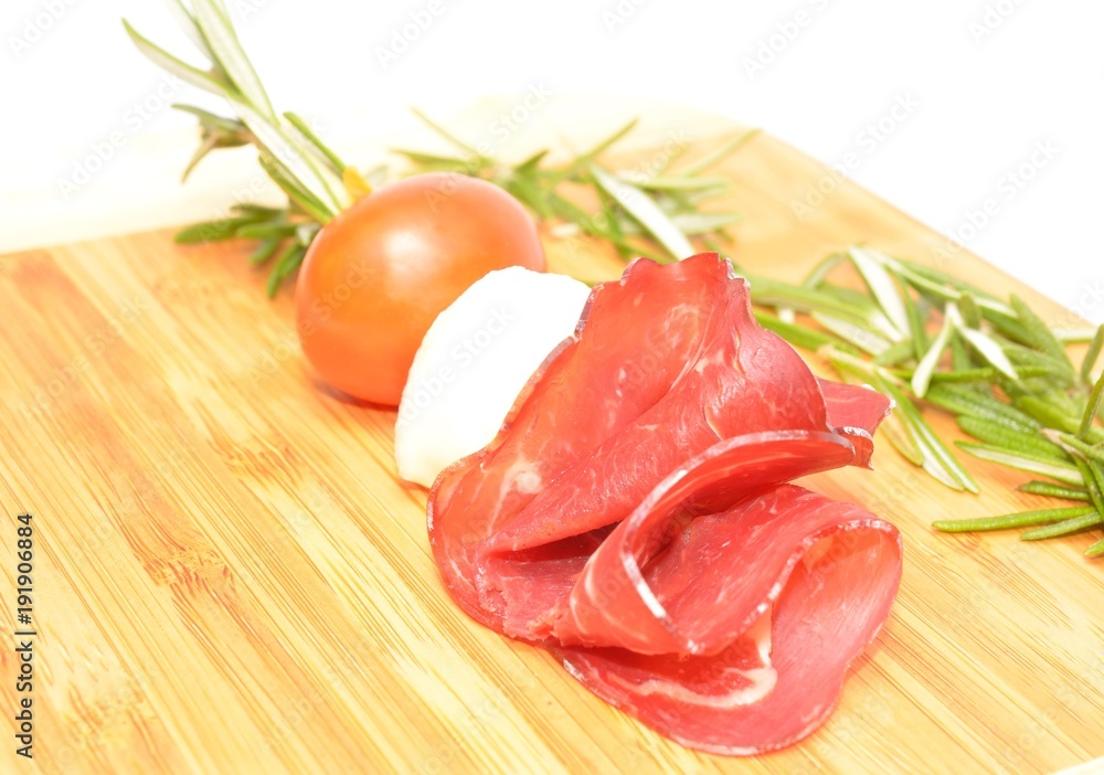 Cream cheese roll ups appetizer with prosciutto and mozzarella Cream cheese roll ups appetizer with prosciutto and mozzarella