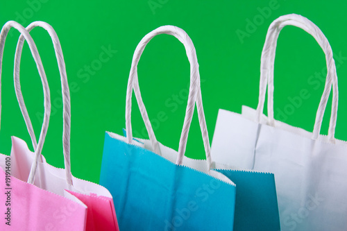 close up of colorful paper shopping bags