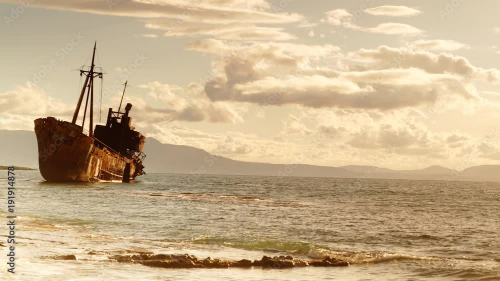 Greek coastline with the famous rusty shipwreck in Glyfada beach near Gytheio, Gythio Laconia Peloponnese Greece 4K