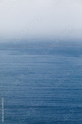 blue sea and mist backdrop