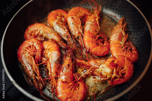 fried shrimps on pan photo