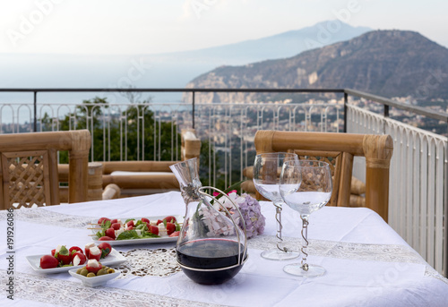 Prepared for supper table on the terrace overlooking the Bay of Naples and  Vesuvius. Sorrento. Italy © wjarek
