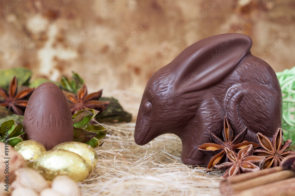 Fototapeta premium Chocolate Easter bilby against a brown background. Australian Easter concept.