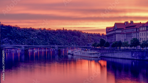 Vltava river of Prague , sunrise moment with still water from long exposure