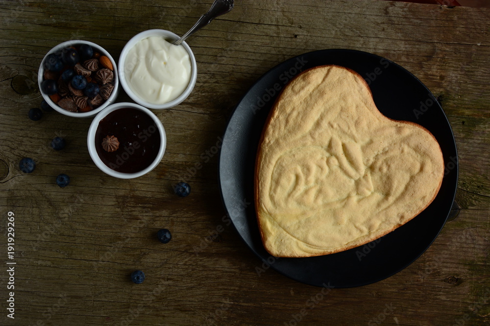 Heart shaped chocolate cake. Top view. Heart shaped chocolate cake. Top view.
