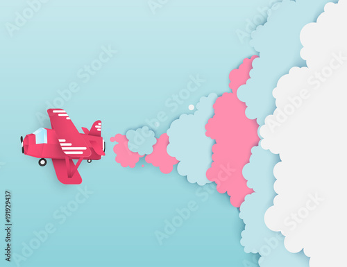 Airplane aerial view paper art with paper cloud ( speech bubble ) for text. Flying origamy paper art red plane. Blue sky background with fluffy clouds