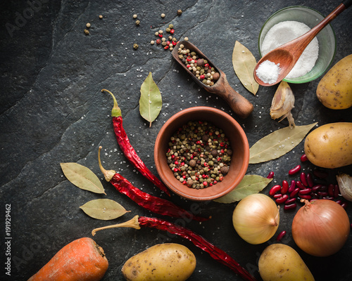 Three red chili peppers. Dry fruits. Acute burning taste.