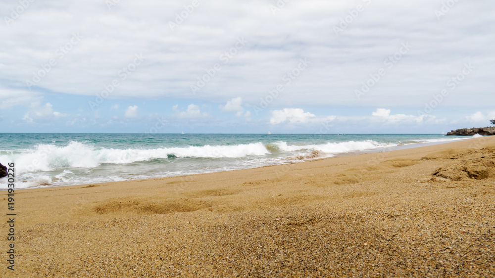 A perfect view of the Atlantic Ocean from a beach in Puerto Plata, Dominican Republic.