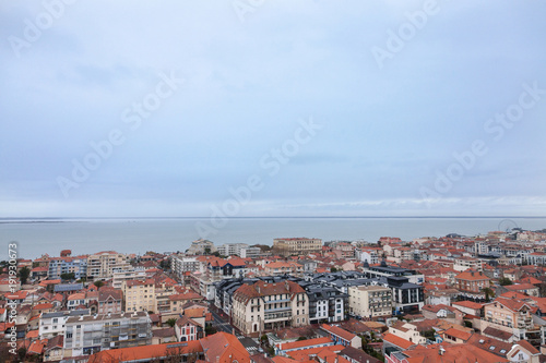Aerial view of Arcachon, France, during a storm on a cloudy rainy day. Located in Arcachon bay (bassin d'Arcachon), the city is one of the most touristic spots of the Atlantic ocean coast in France