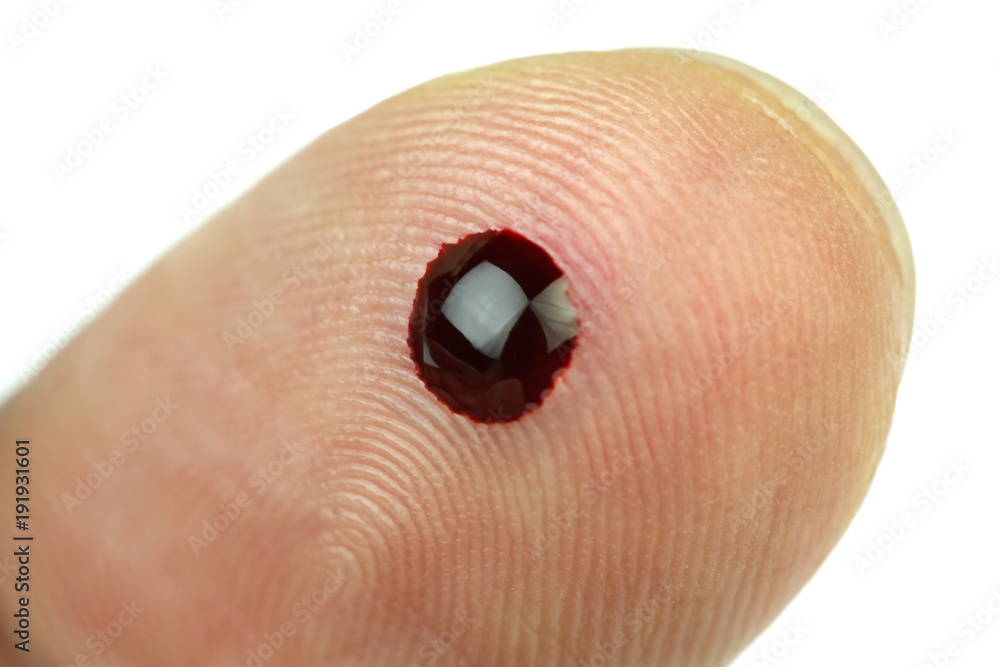Blood drop on finger to check high blood sugar