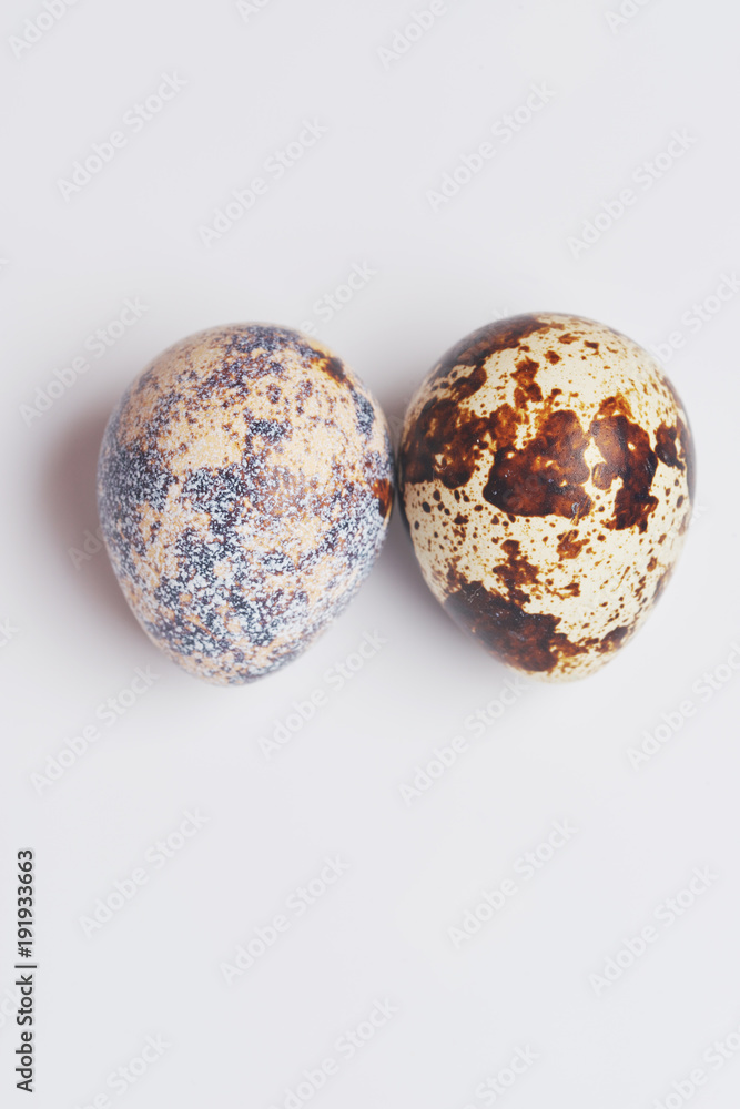 Two Quail eggs on white background. preparation for Easter Two Quail eggs on white background. preparation for Easter