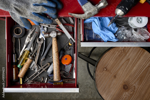 overhead view of drawers full of tools in a workshop