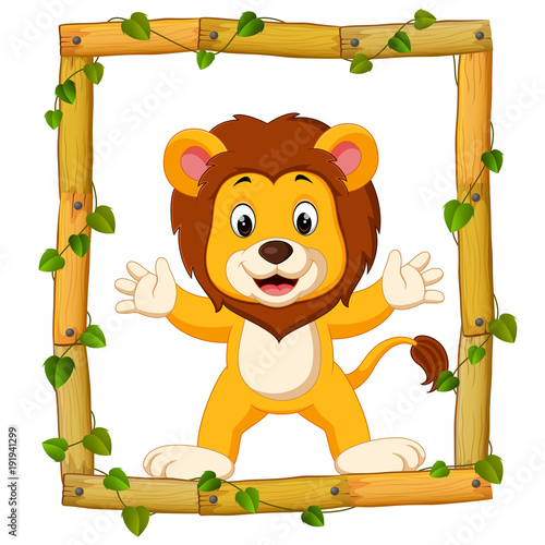 Fototapeta Naklejka Na Ścianę i Meble -  Lion on the wood frame with roots and leaf