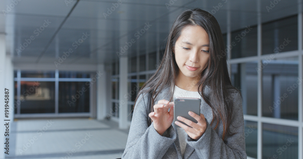Business woman using smart phone at outdoor Business woman using smart phone at outdoor