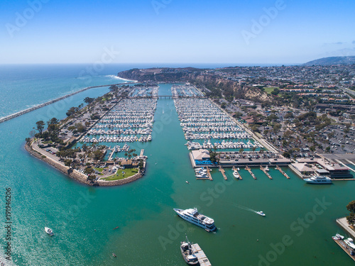 Aerial view of harbor with luxury boats and yachts in Orange County, Southern California 