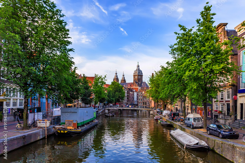 Beautiful view of canal and buildings of Amsterdam