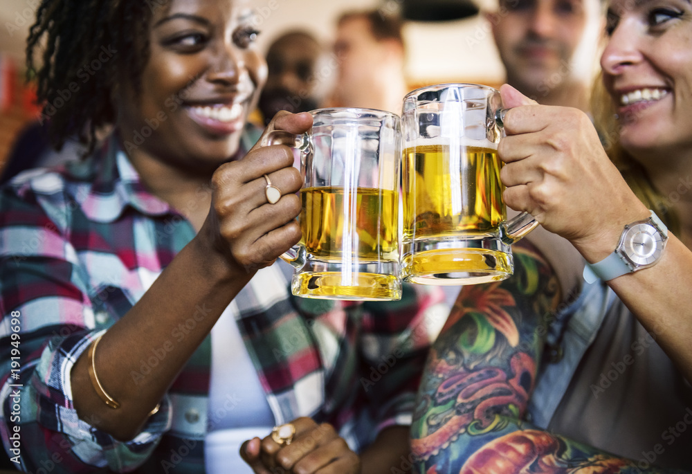 Frieds cheering sport at bar together Frieds cheering sport at bar together