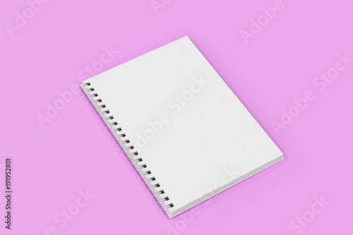 Opend notebook spiral bound on violet background