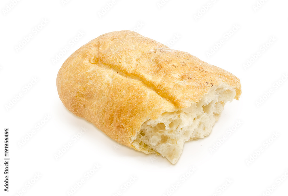 Broken piece of ciabatta on a white background Broken piece of ciabatta on a white background