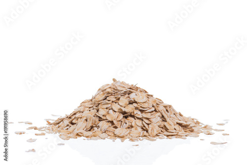 Oat flakes isolated on white