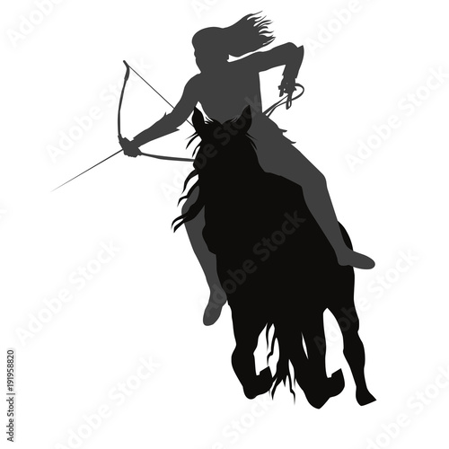 Wild amazon girl with a bow on horseback