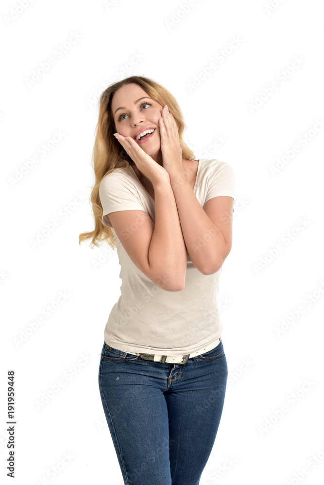 3/4 portrait of blonde girl wearing white shirt, happy expression. isolated on white background. 3/4 portrait of blonde girl wearing white shirt, happy expression. isolated on white background.