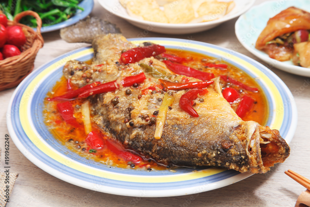 Fried bass fish with chili sause, Chinese food Fried bass fish with chili sause, Chinese food