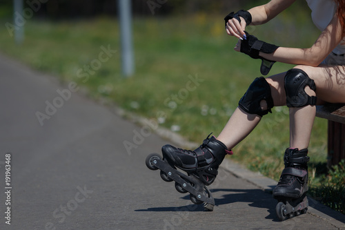 Beautiful young girl roller skating