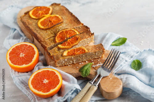 Healthy homemade orange-coconut cake, copy space. Healthy vegan food concept.