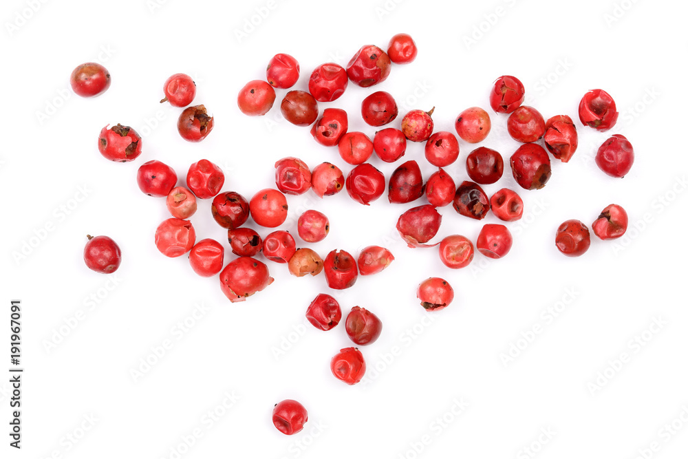 pink peppercorns seeds isolated on white background. Top view. Flat lay pink peppercorns seeds isolated on white background. Top view. Flat lay