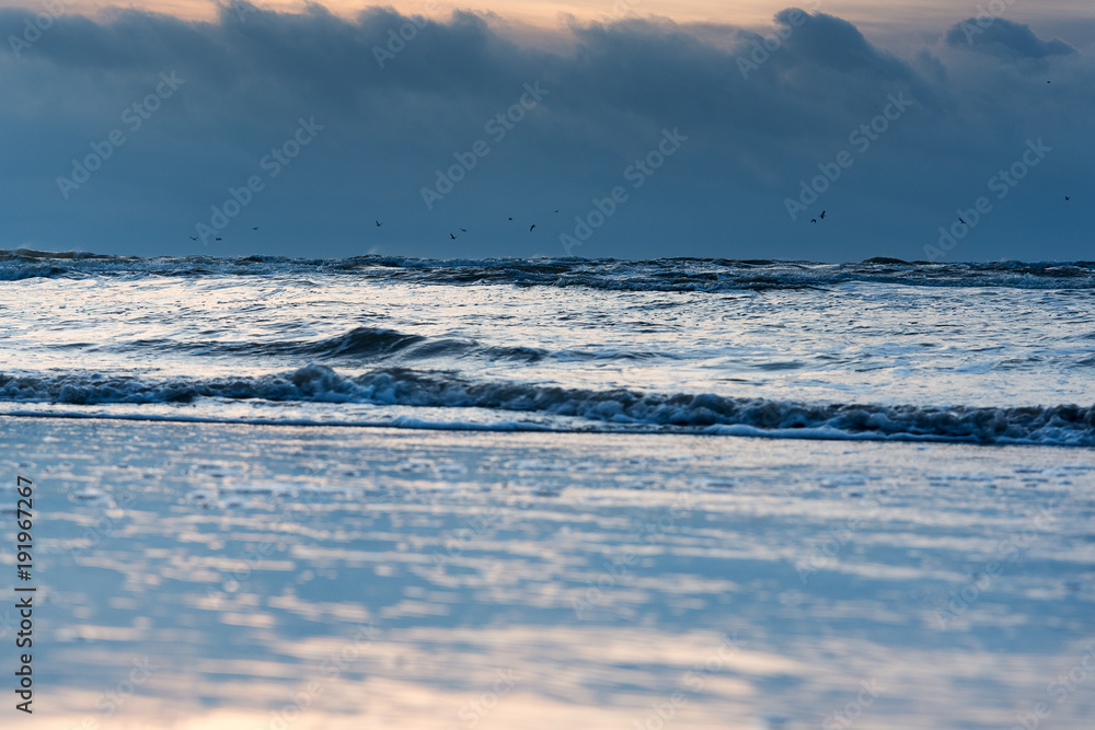 Restless Baltic sea in evening time.