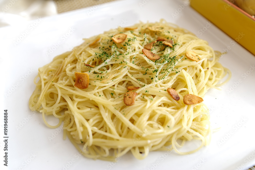 oil base pasta Spaghetti Aglio on the table oil base pasta Spaghetti Aglio on the table